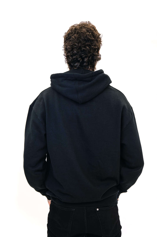 Man wearing Avalanche Essentials Hoodie back view